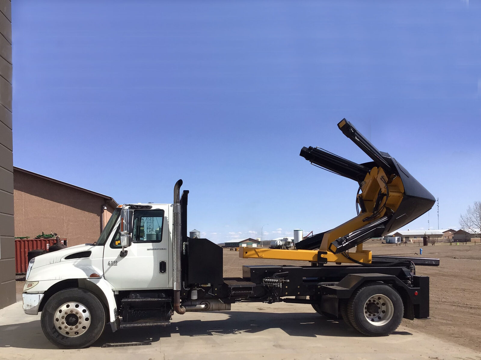 Holt truck-mounted tree spade at work