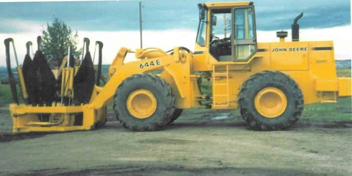 Holt loader mounted tree spades